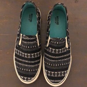 Tribal print slip on sneakers